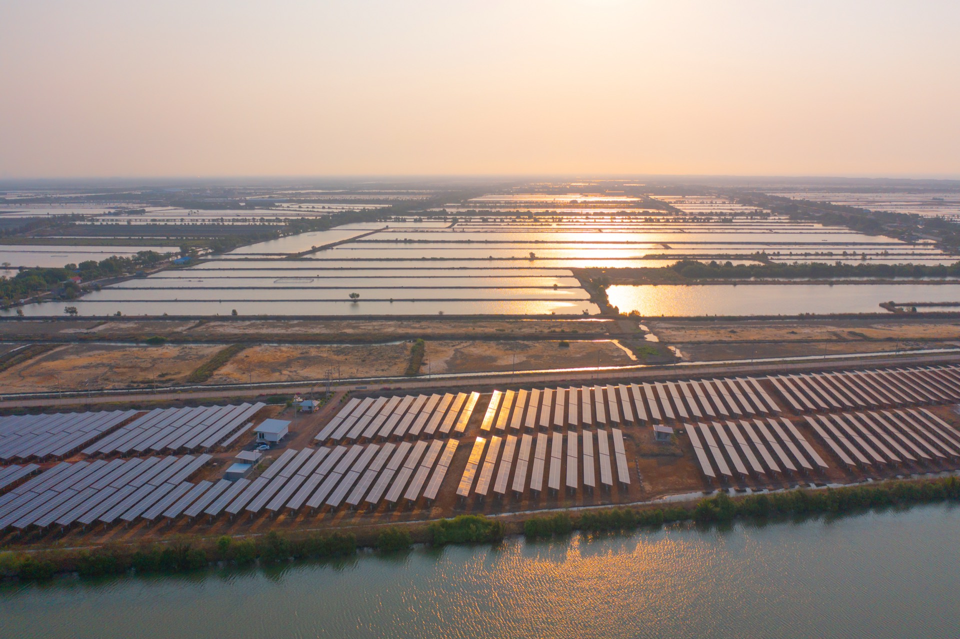 Solar power plant at sunset